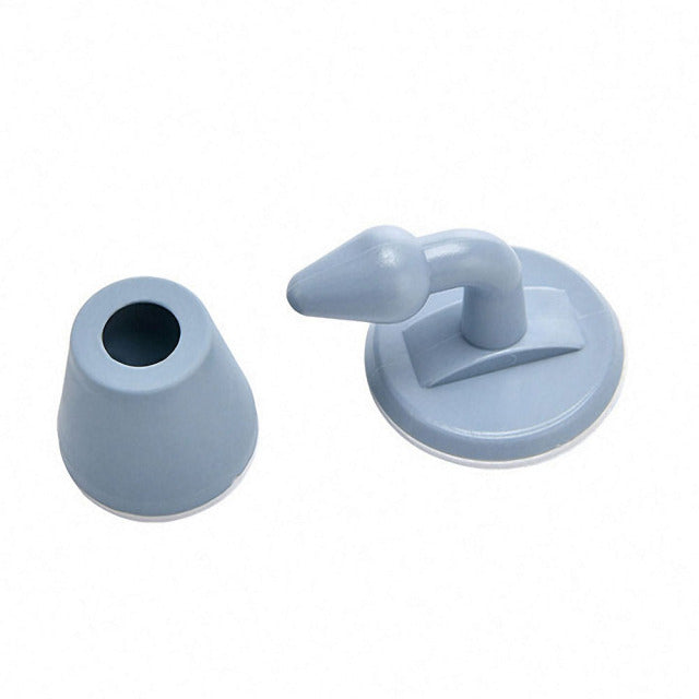 Adhesive door stopper