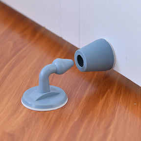Adhesive door stopper